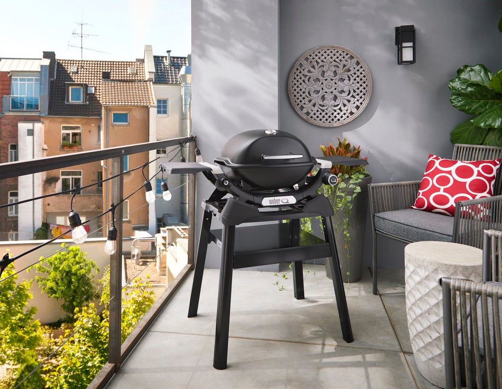 Weber Q1200N Gas Grill with Stand on a balcony in Dublin