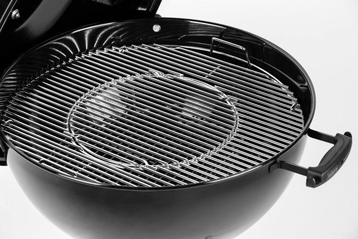 Stainless steel grill grates sitting in a Master-Touch