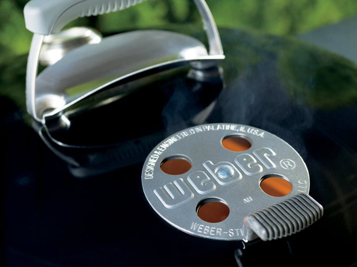 Heat control vent on Weber Performer barbecue lid