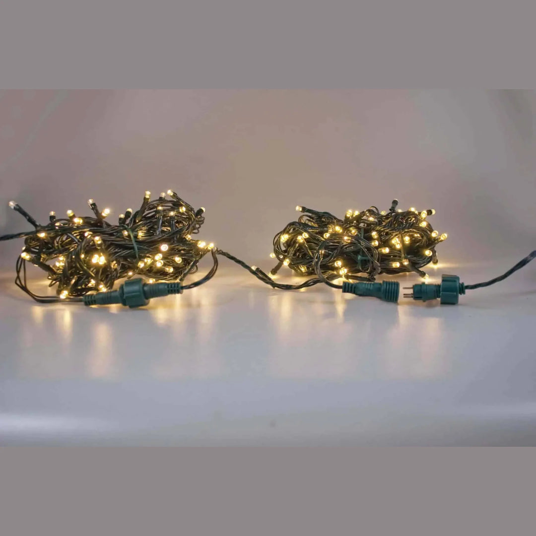 Warm white 100 LED extension set for Christmas lights on green cable