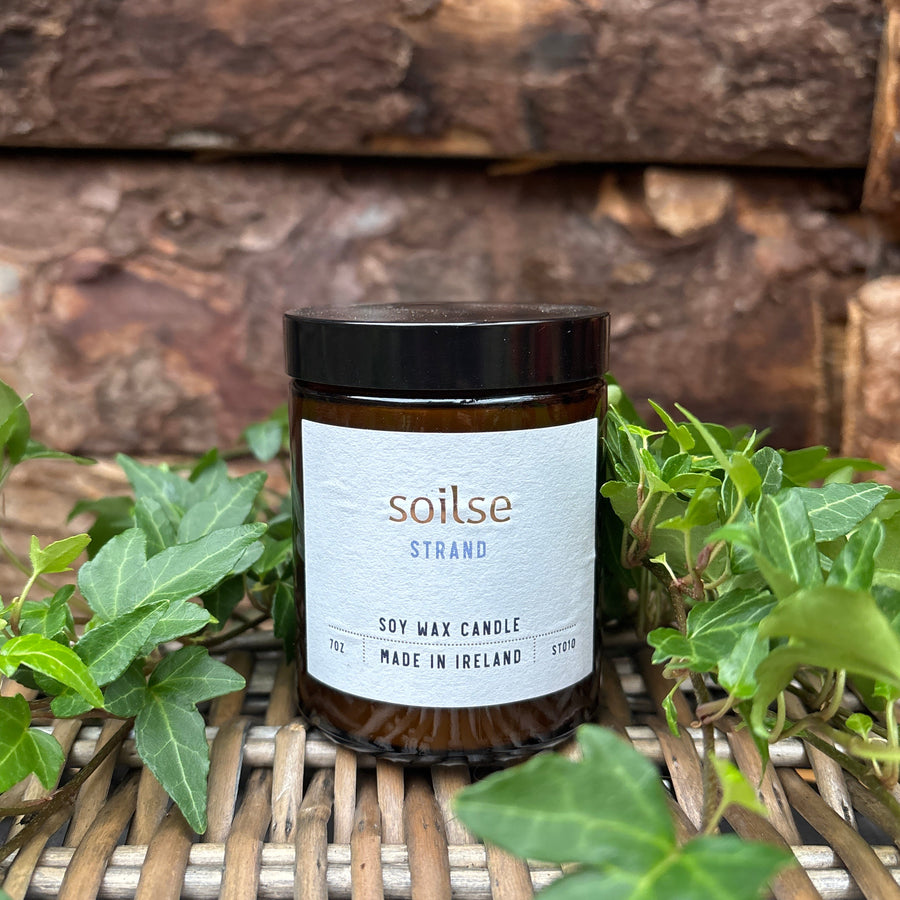 Soilse Strand Apothecary Amber Jar Candle with water lily, seaweed, and amber scent notes