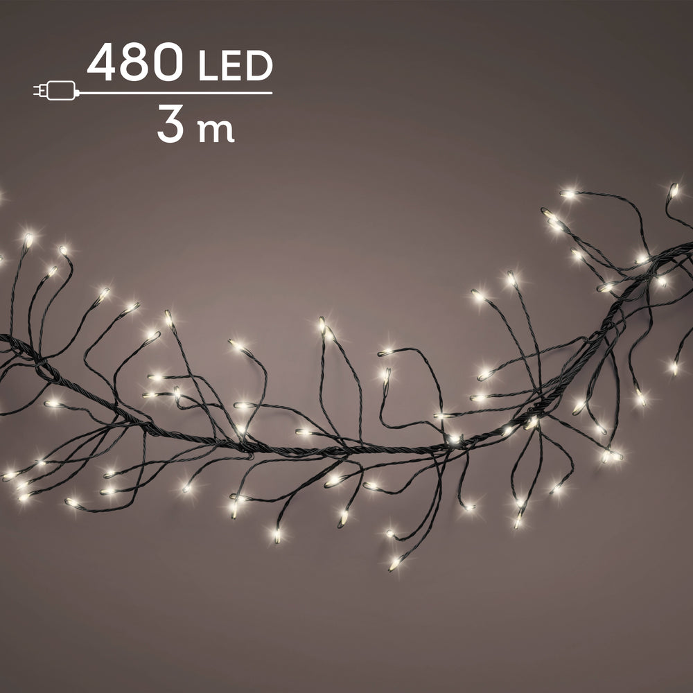 Plug-in micro LED cluster lights with 8 twinkle functions, warm white on green cable, outdoor, 3m, alternate view