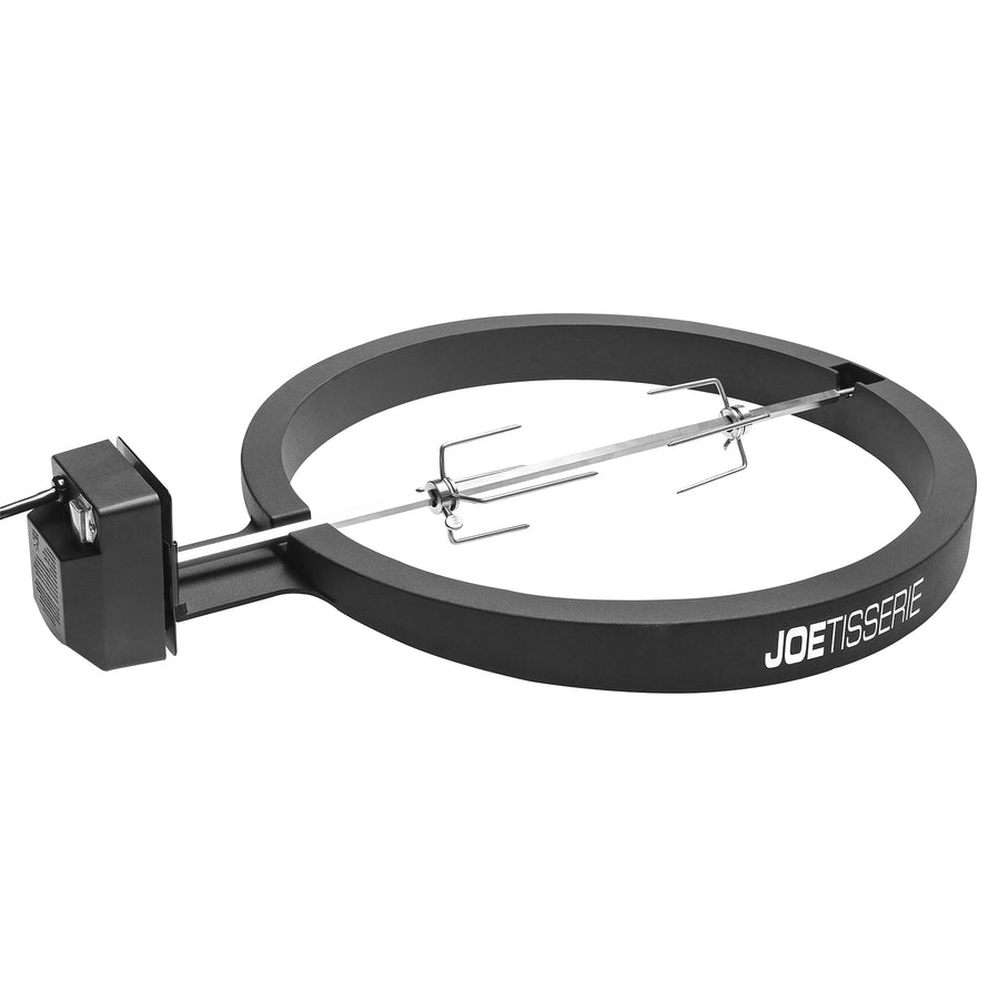 Kamado Joe Joetisserie rotisserie for Big Joe showing stainless steel spit, meat forks, motor and wedge ring