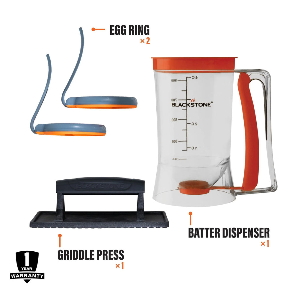Blackstone Griddle Accessory Kit with egg rings, griddle press, and batter dispenser on a white background.