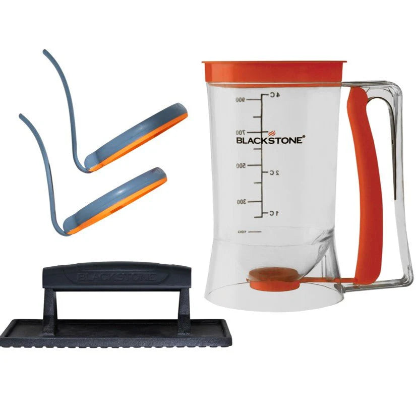Blackstone Breakfast Kit set with a pitcher, griddle press, and egg shaper on a white background