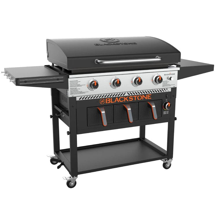 Blackstone grill with air fryers on a white background