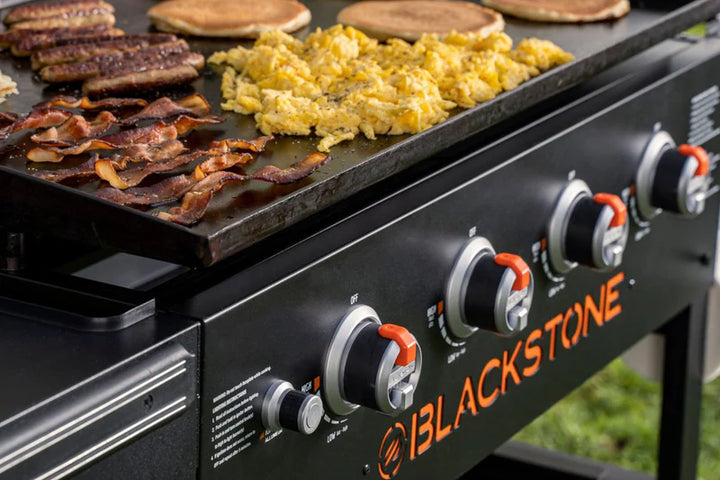 Blackstone grill with food on a cooking surface