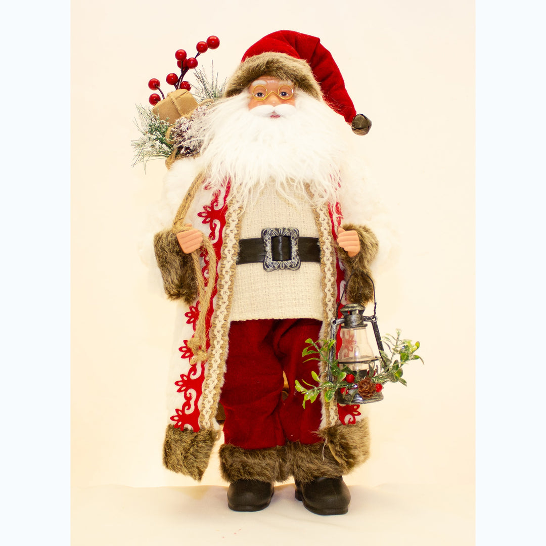 Decorative Santa Claus figure holding a lantern and basket on a beige background