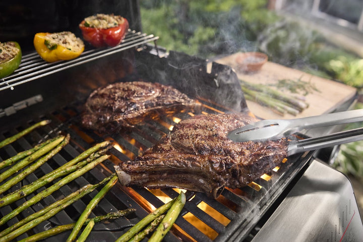 Steak cooking on Weber Spirit E-310 BBQ