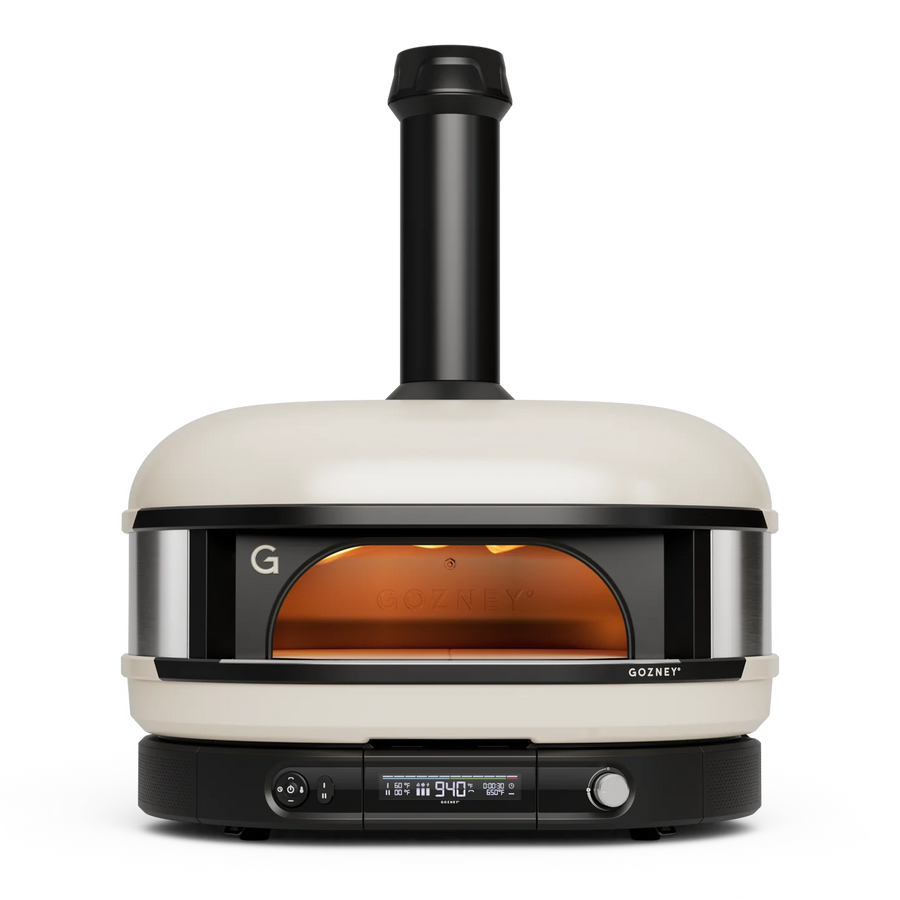 Gozney Dome in bone colour outdoor pizza oven with black chimney on a white background
