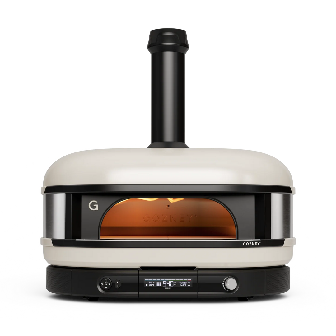 Gozney Dome XL pizza oven with a white exterior and black accents on a white background