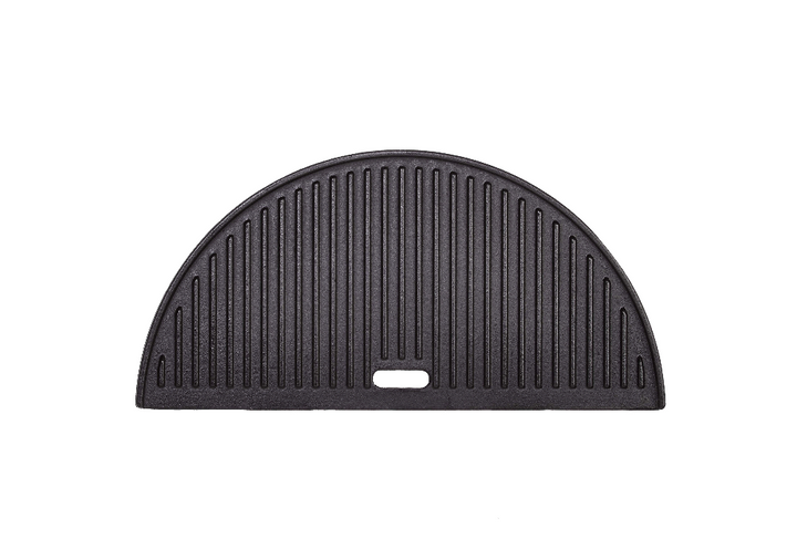 Ribbed side of the Kamado Joe reversible cast iron griddle giving steaks sear marks
