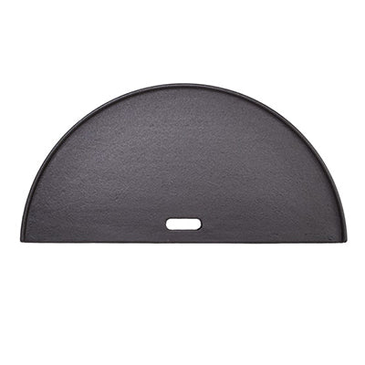 Smooth flat-top side of the Kamado Joe half moon cast iron griddle for cooking eggs, pancakes and smash burgers