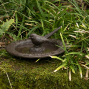 Sun dial with bird bath