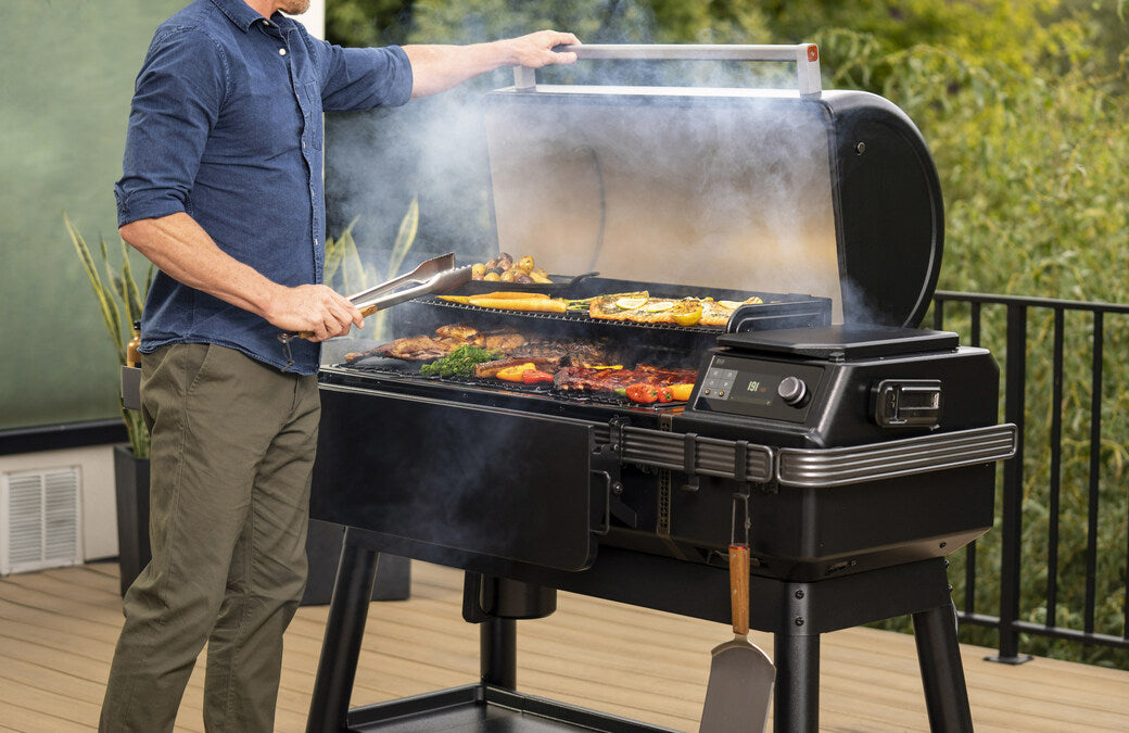 Man grilling on a Traeger Ironwood XL