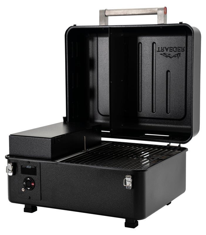 Traeger Ranger Pellet Smoker on a white background with the lid open