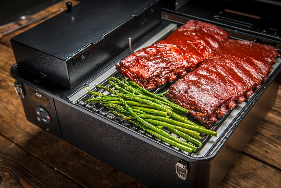 Pork cooking on a Traeger Ranger