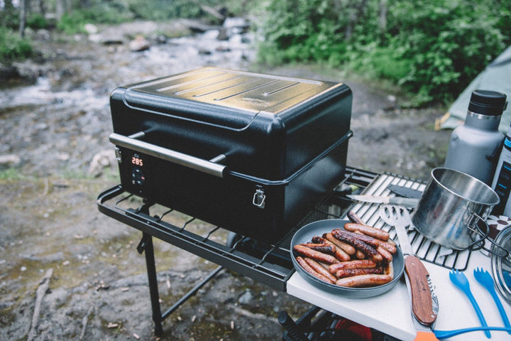 Traeger Ranger set up with a forest background