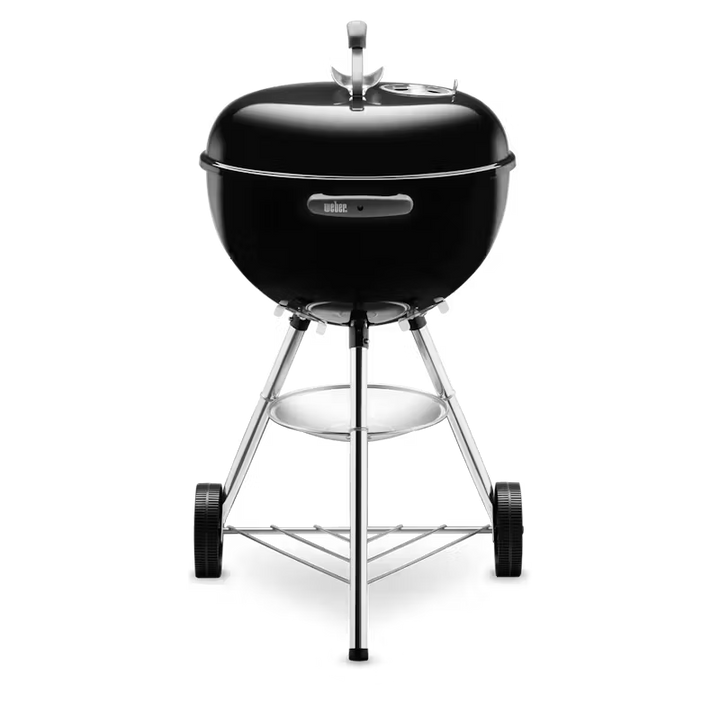 Black Weber barbecue grill on a white background