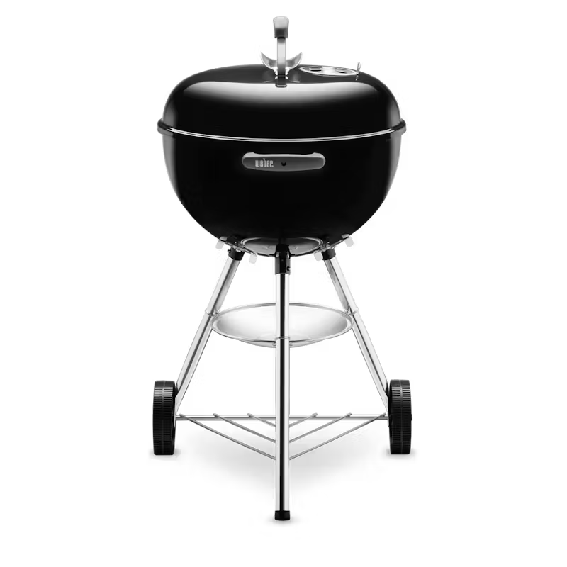 Black Weber barbecue grill on a white background