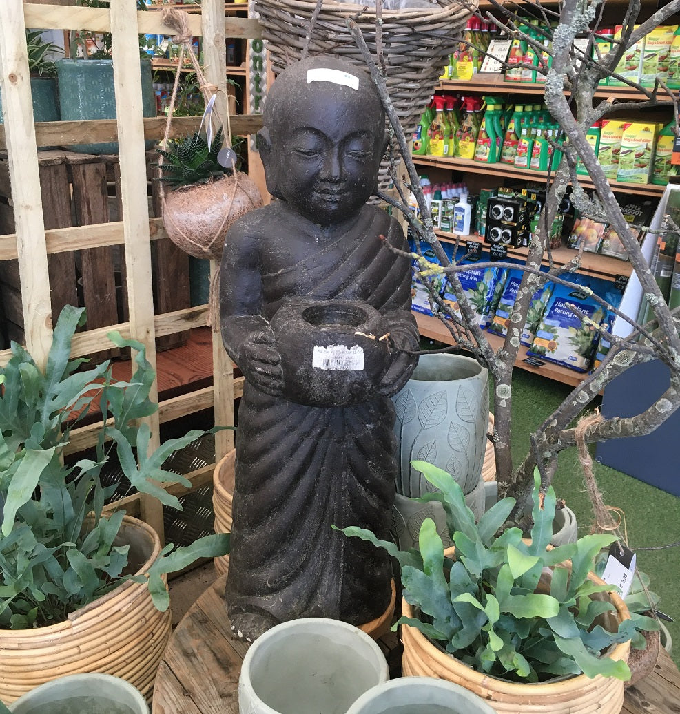 Standing monk with bowl