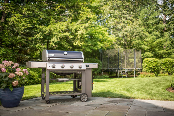 Weber Genesis II E-410 black in a garden centre