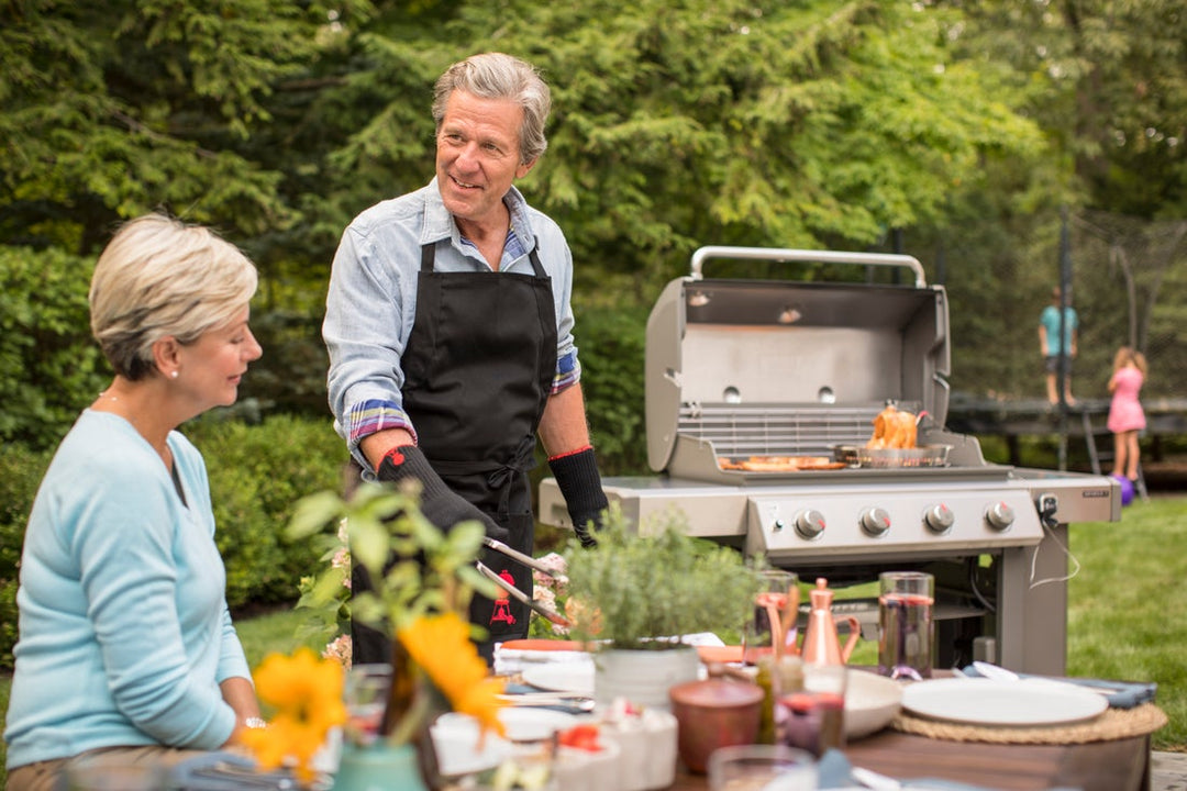 Weber Poultry Roaster cooking on Genesis II E-410