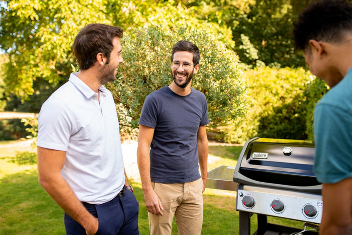 Weber Spirit E-310 BBQ in a garden in Ireland